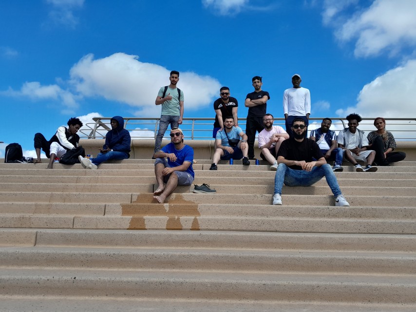 Young people sitting on stairs